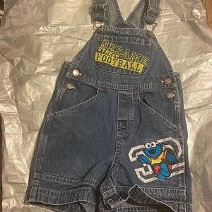 RARE FIND COOKIE MONSTER JEAN OVERALL SHORTS 4 SNAPS ON CROTCH FOR EASY CHANGING